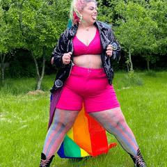 Model wearing rainbow coloured fishnets